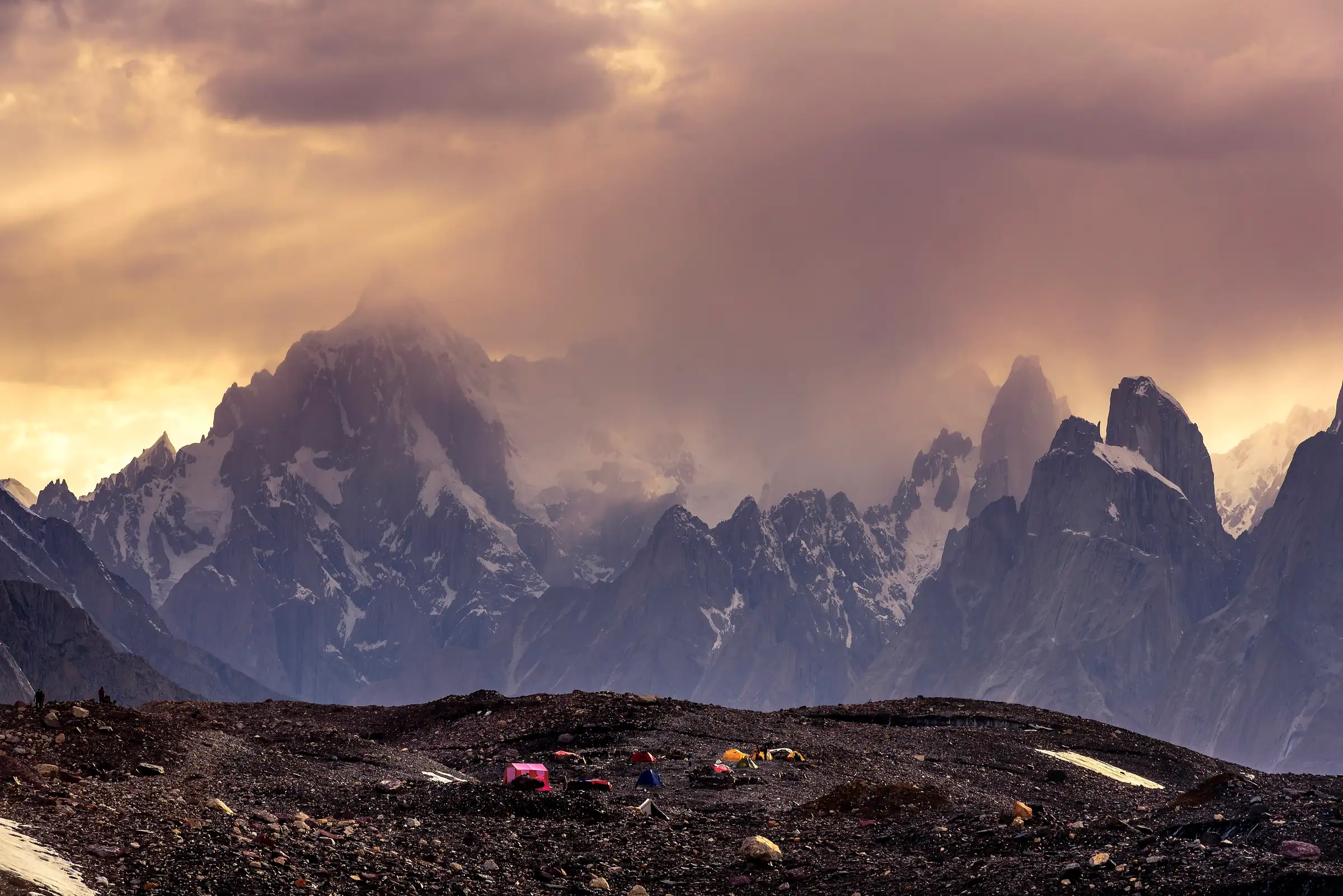 Tents at Concordia under the Karakoram peaks at sunset